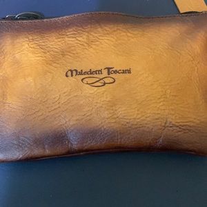 100% authentic https://www.maledettitoscani.com leather wristlet.